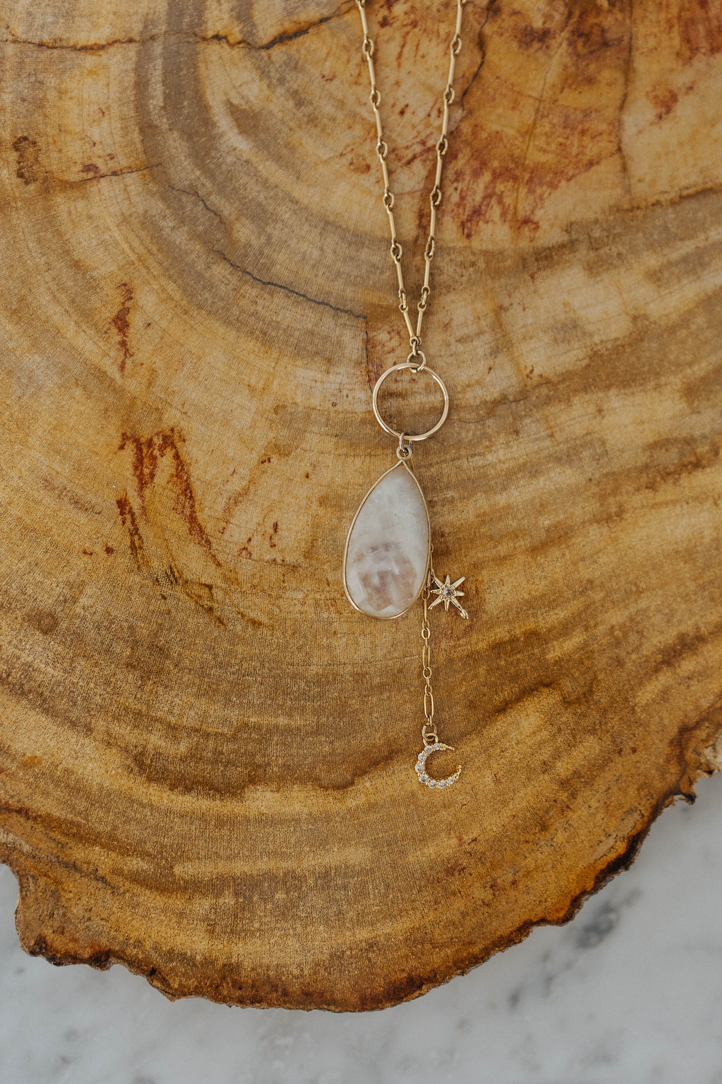 Moonstone pendant necklace with charms